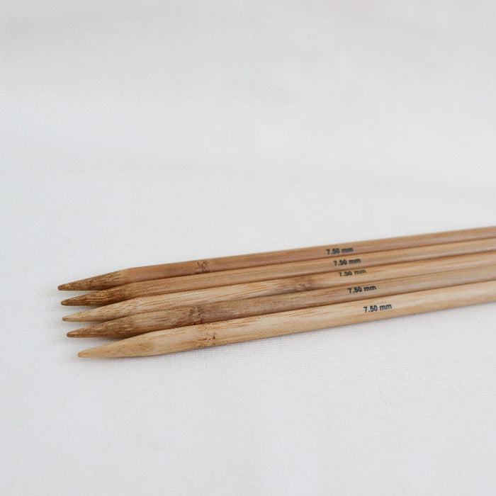 Set of 5 phoenix gold/bamboo double pointed knitting needles.