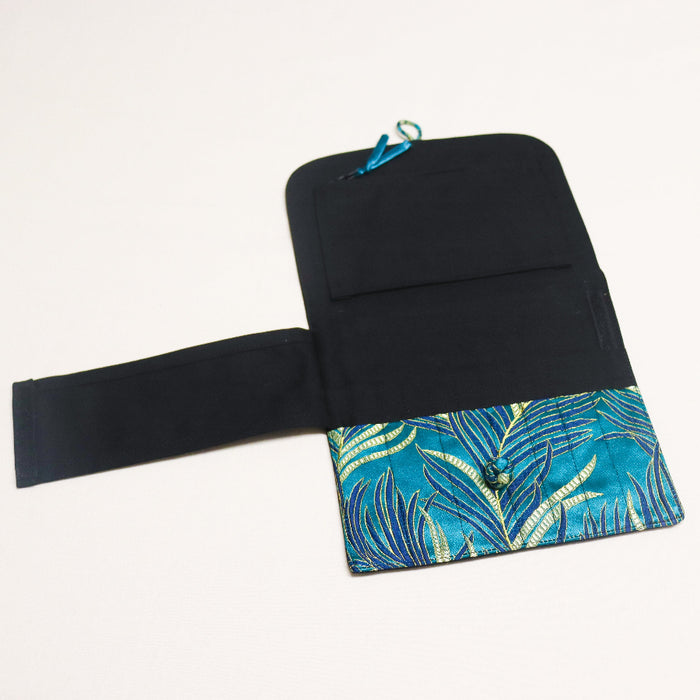 hiayhiya teal Chinese brocade style interchangeable needle case.