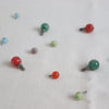 hiyahiya bead cable stoppers. Sparkly colourful bead with screw connection attached to join to end of interchangeable cables.