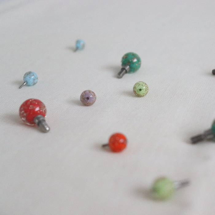 hiyahiya bead cable stoppers. Sparkly colourful bead with screw connection attached to join to end of interchangeable cables.