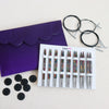 KnitPro Deluxe Symfonie Interchangeable Needle Set. 8 colourful symfonie needle tips cable and accessories in a purple plush case.