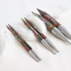 knitpro symfonie interchangeable knitting needle tips. Multicoloured layered wood tips with silver metal connecting joins.