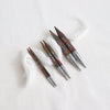 knitpro symfonie interchangeable knitting needle tips. Multicoloured layered wood tips with silver metal connecting joins.