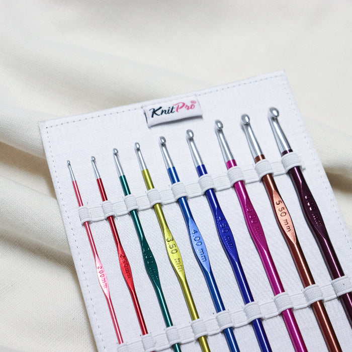 Knitpro zing crochet hooks set. Different coloured crochet hooks in a pink plush case.