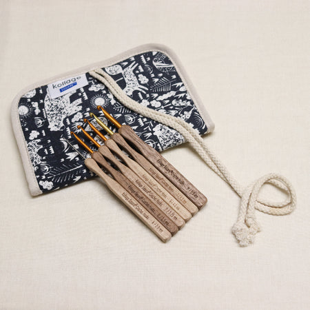 kollage square crochet hook set. Aluminium crochet hooks with a wooden handle in a black and white soft cloth pouch with elastic slots for hooks and zipped pouch.