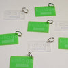 Kollage acrylic keychain in green and clear