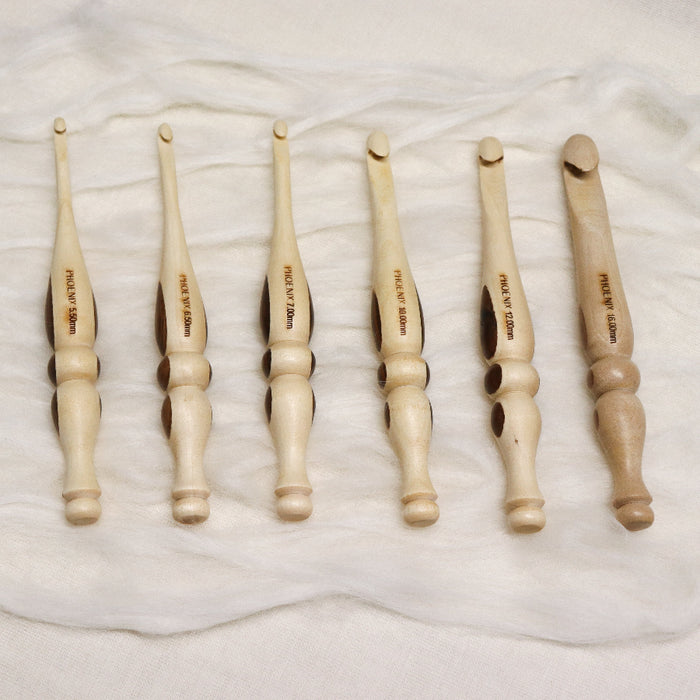 Phoenix wood crochet hooks with multiwood bubble shaped handle.