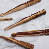 striped wood ergonomic crochet hook with ribbed handle design