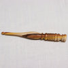 striped wood ergonomic crochet hook with ribbed handle design