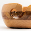 light wood yarn bowl with sheesham wood stripe through the middle horizontally