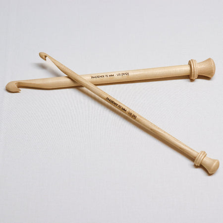 phoenix acer maple wood crochet hooks. 12" long hook with logo and size in MM and US engraved into the middle of the hook. The crochet hook is on one end and  small knob on the other.