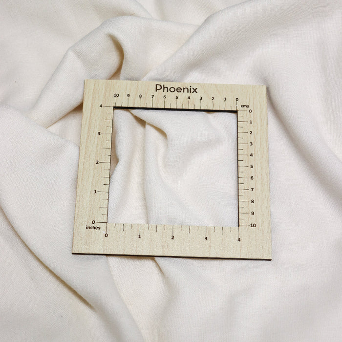 phoenix stitch/swatch gauge with cm and inch measurements