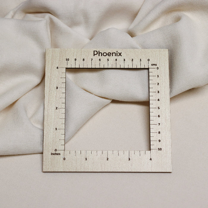 phoenix stitch/swatch gauge with cm and inch measurements